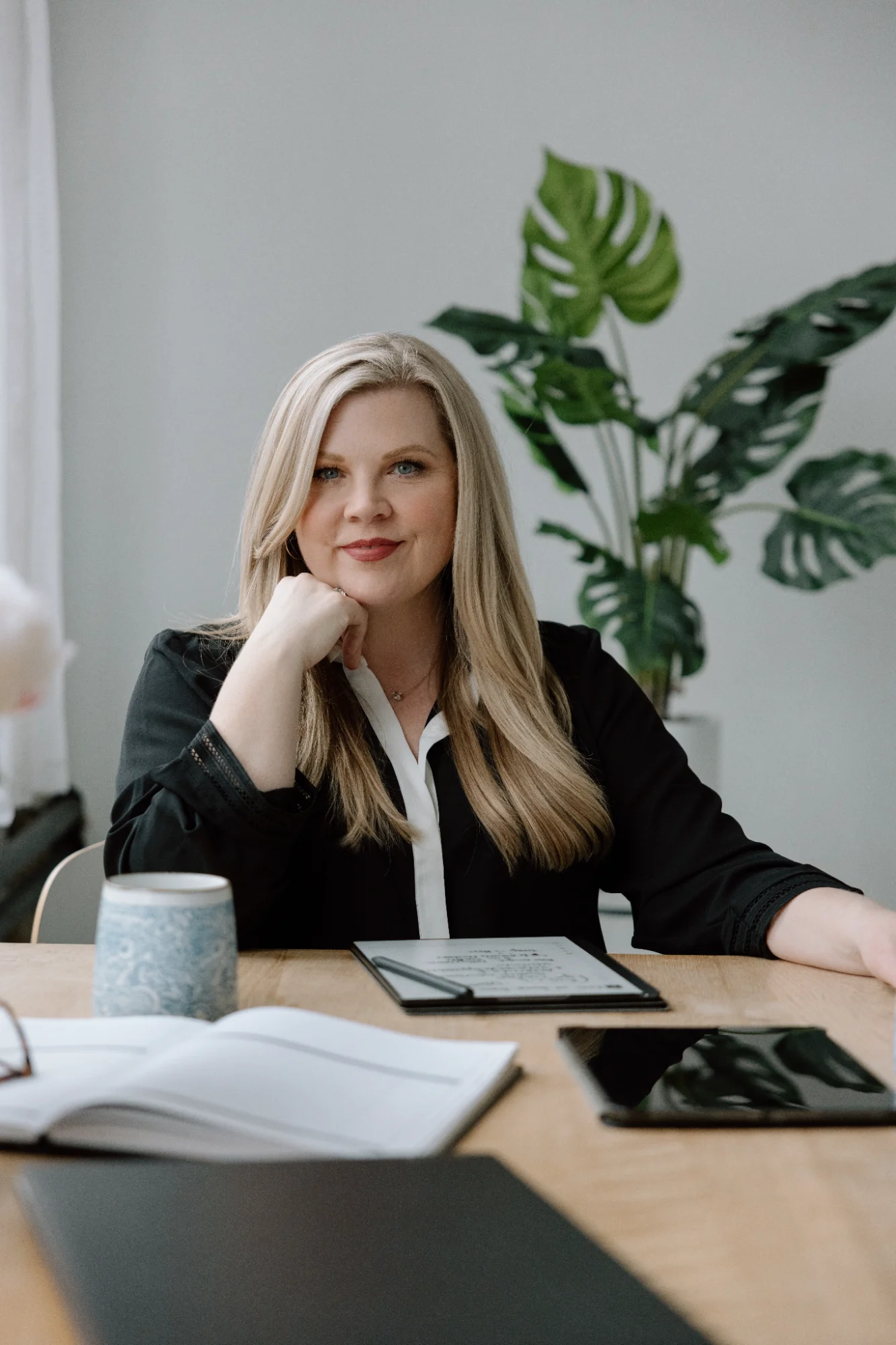 Tricia Smith seated at a work table